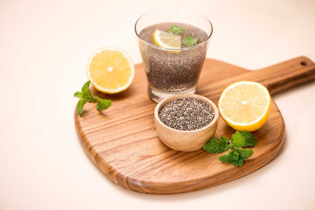 Chia seeds soaking in water in a glass