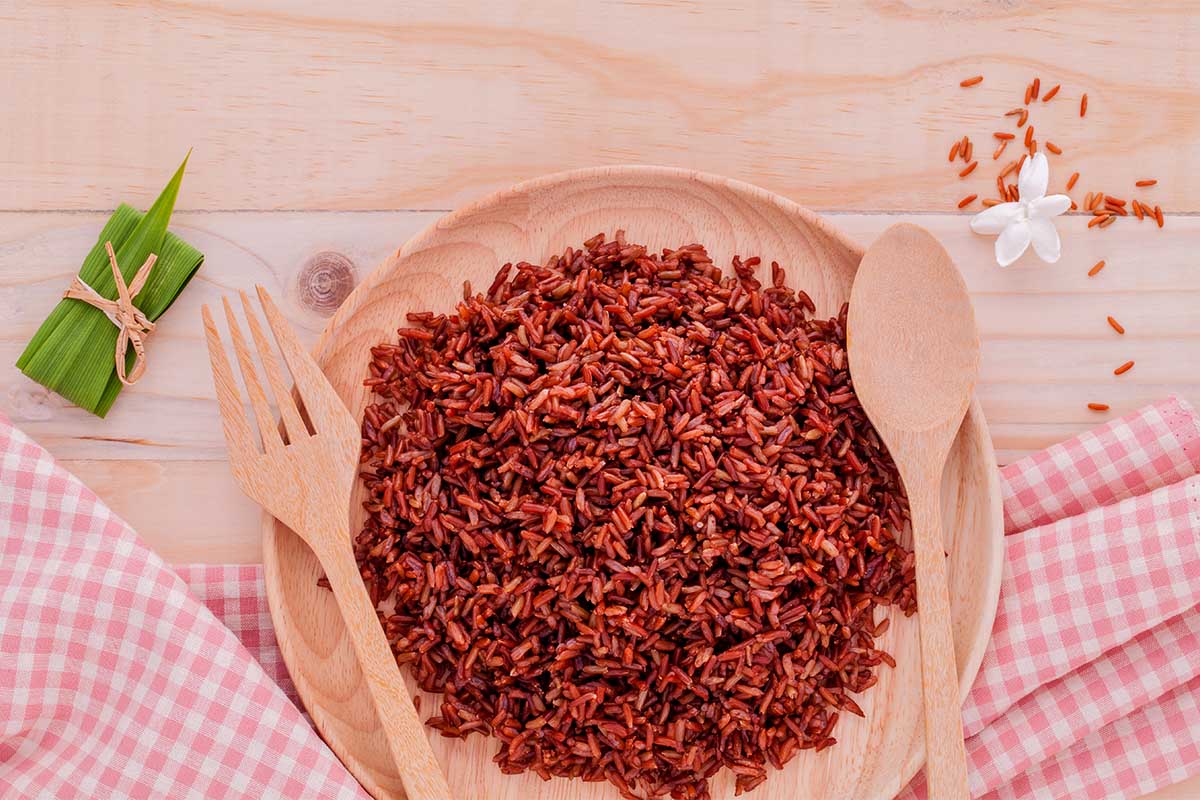 Plate of fluffy Mexican red rice garnished with cilantro